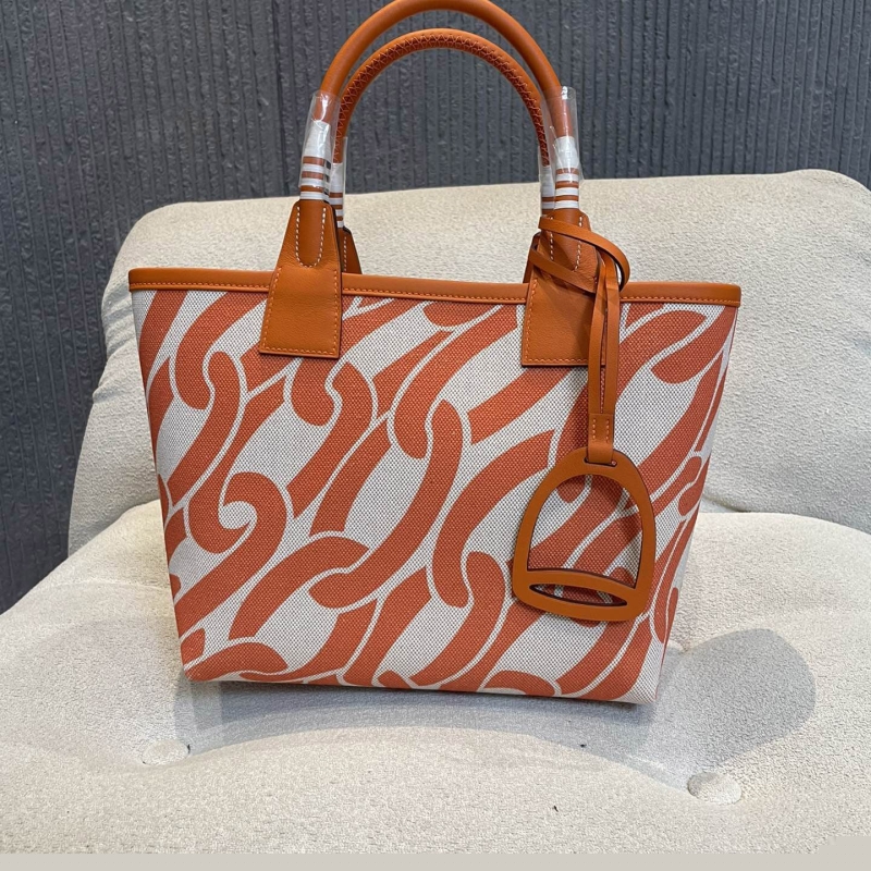 H**mes shopping bags